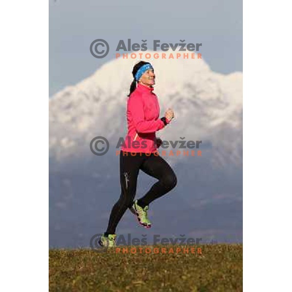 Anica Zivko of Slovenia, mountain runner from Celje during practice session with new Garmin Forerunner 610 in the hills near Kranj, Slovenia on December 6, 2011 