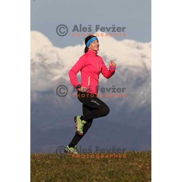 Anica Zivko of Slovenia, mountain runner from Celje during practice session with new Garmin Forerunner 610 in the hills near Kranj, Slovenia on December 6, 2011 
