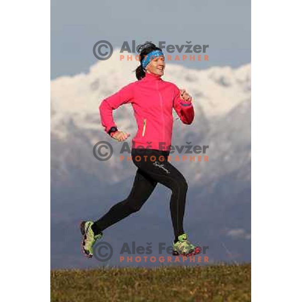 Anica Zivko of Slovenia, mountain runner from Celje during practice session with new Garmin Forerunner 610 in the hills near Kranj, Slovenia on December 6, 2011 