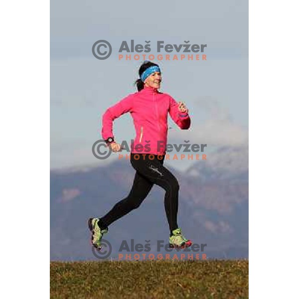 Anica Zivko of Slovenia, mountain runner from Celje during practice session with new Garmin Forerunner 610 in the hills near Kranj, Slovenia on December 6, 2011 
