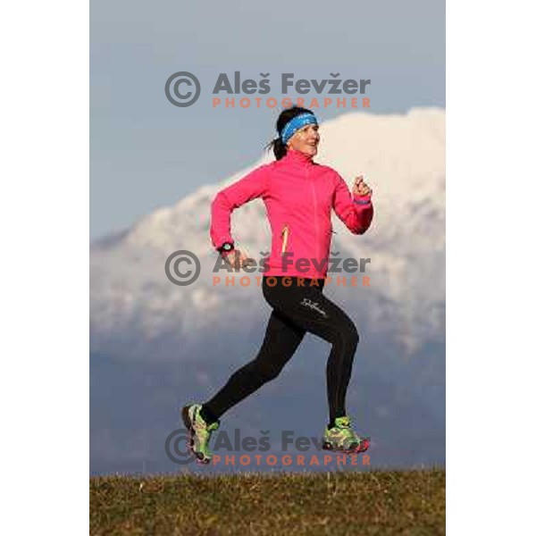 Anica Zivko of Slovenia, mountain runner from Celje during practice session with new Garmin Forerunner 610 in the hills near Kranj, Slovenia on December 6, 2011 