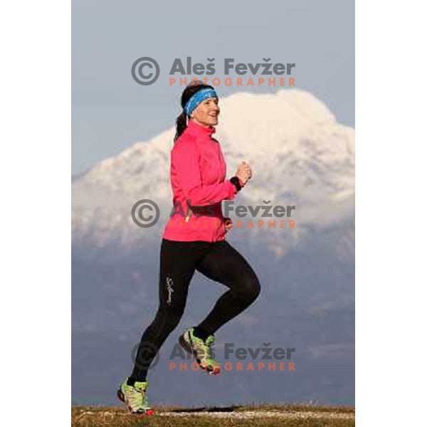 Anica Zivko of Slovenia, mountain runner from Celje during practice session with new Garmin Forerunner 610 in the hills near Kranj, Slovenia on December 6, 2011 