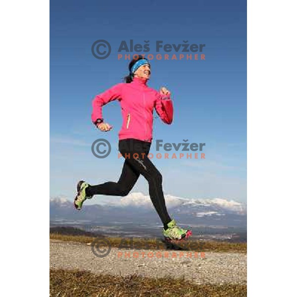 Anica Zivko of Slovenia, mountain runner from Celje during practice session with new Garmin Forerunner 610 in the hills near Kranj, Slovenia on December 6, 2011 