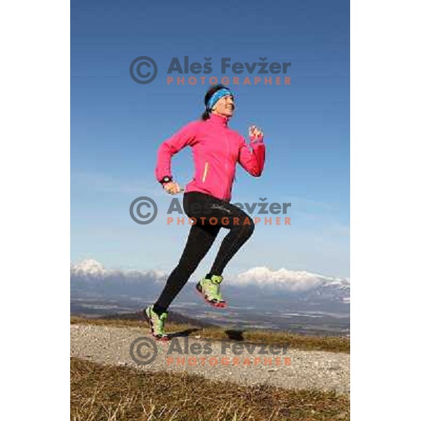 Anica Zivko of Slovenia, mountain runner from Celje during practice session with new Garmin Forerunner 610 in the hills near Kranj, Slovenia on December 6, 2011 