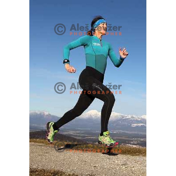 Anica Zivko of Slovenia, mountain runner from Celje during practice session with new Garmin Forerunner 610 in the hills near Kranj, Slovenia on December 6, 2011 
