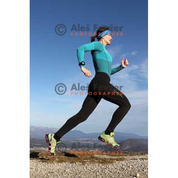 Anica Zivko of Slovenia, mountain runner from Celje during practice session with new Garmin Forerunner 610 in the hills near Kranj, Slovenia on December 6, 2011 
