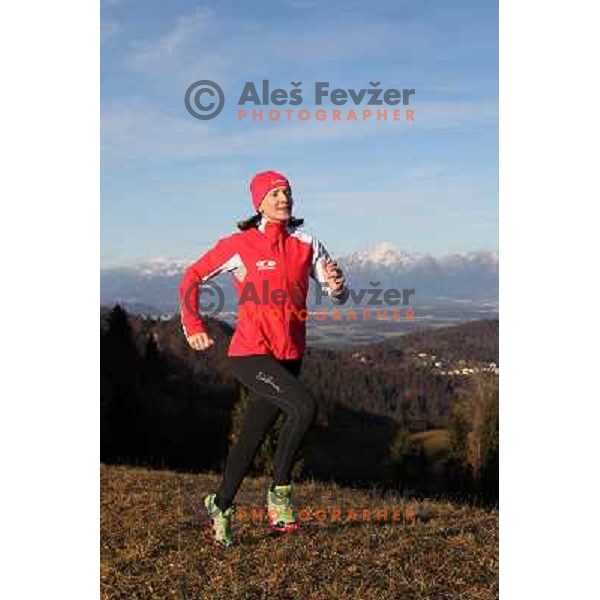 Anica Zivko of Slovenia, mountain runner from Celje during practice session with new Garmin Forerunner 610 in the hills near Kranj, Slovenia on December 6, 2011 