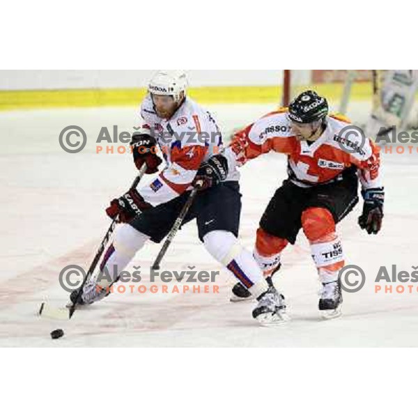 Andrej Tavzelj of Slovenia in action during friendly ice-hockey match between Slovenia and Switzerland in Hala Tivoli, Ljubljana, Slovenia on December 14, 2011 