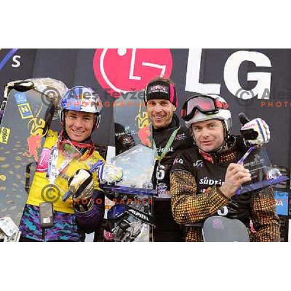 Rok Flander of Slovenia (right) took thord place during LG Snowboard FIS World Cup Parallel Giant Slalom 2011-2012 in Carezza, Dolomites, Italy on December 21, 2011 