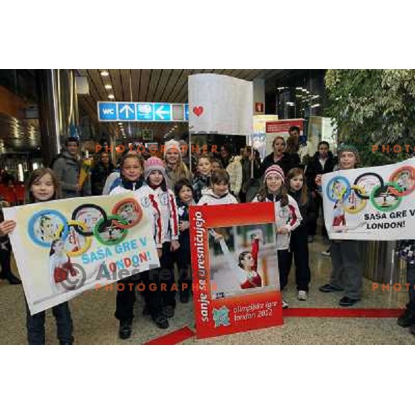 Slovenian gymnast Sasa Golob receives warm welcome from his friends and fans at Joze Pucnik Airport, Ljubljana, Slovenia on January 14, 2012 after success at Olympic qualification event for London 2012 Olympic games. She will be olympian for the first tim