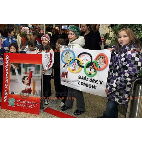 Slovenian gymnast Sasa Golob receives warm welcome from his friends and fans at Joze Pucnik Airport, Ljubljana, Slovenia on January 14, 2012 after success at Olympic qualification event for London 2012 Olympic games. She will be olympian for the first tim