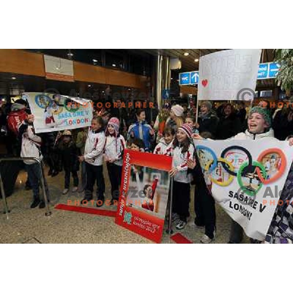 Slovenian gymnast Sasa Golob receives warm welcome from his friends and fans at Joze Pucnik Airport, Ljubljana, Slovenia on January 14, 2012 after success at Olympic qualification event for London 2012 Olympic games. She will be olympian for the first tim