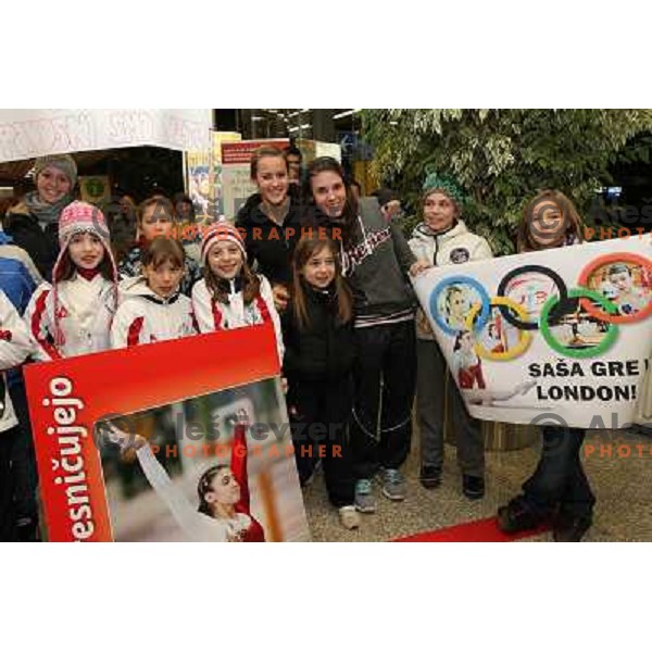 Slovenian gymnast Sasa Golob receives warm welcome from his friends and fans at Joze Pucnik Airport, Ljubljana, Slovenia on January 14, 2012 after success at Olympic qualification event for London 2012 Olympic games. She will be olympian for the first tim