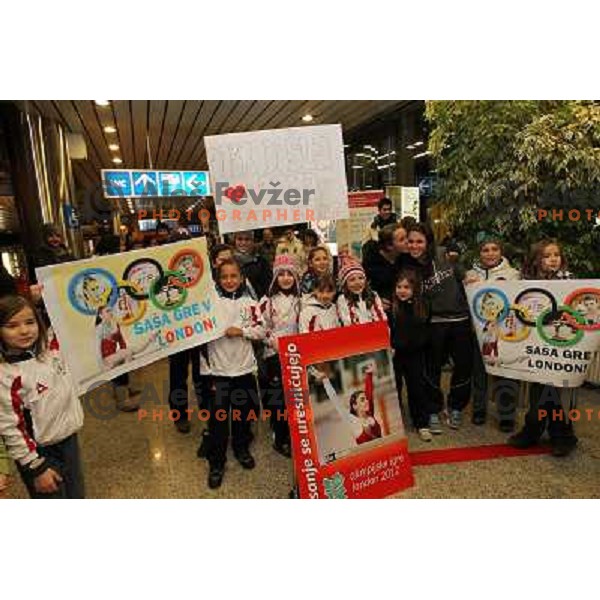 Slovenian gymnast Sasa Golob receives warm welcome from his friends and fans at Joze Pucnik Airport, Ljubljana, Slovenia on January 14, 2012 after success at Olympic qualification event for London 2012 Olympic games. She will be olympian for the first tim