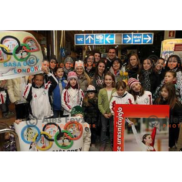 Slovenian gymnast Sasa Golob receives warm welcome from his friends and fans at Joze Pucnik Airport, Ljubljana, Slovenia on January 14, 2012 after success at Olympic qualification event for London 2012 Olympic games. She will be olympian for the first tim