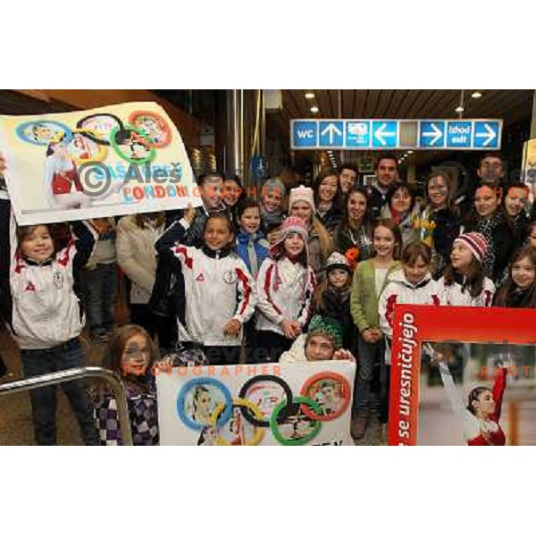 Slovenian gymnast Sasa Golob receives warm welcome from his friends and fans at Joze Pucnik Airport, Ljubljana, Slovenia on January 14, 2012 after success at Olympic qualification event for London 2012 Olympic games. She will be olympian for the first tim