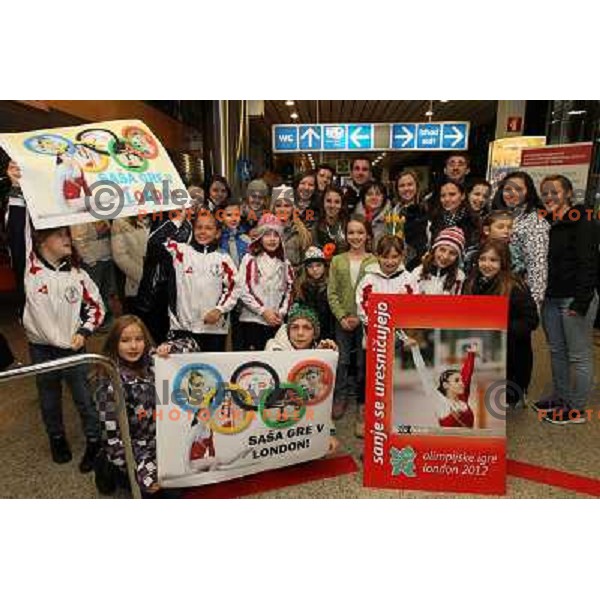 Slovenian gymnast Sasa Golob receives warm welcome from his friends and fans at Joze Pucnik Airport, Ljubljana, Slovenia on January 14, 2012 after success at Olympic qualification event for London 2012 Olympic games. She will be olympian for the first tim