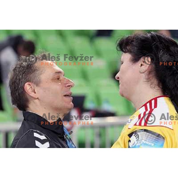 Tone Tiselj of Krim Mercator and Luminita Dinu of C.S. Oltchim Valcea during handball match RK Krim Mercator (Slovenia) and C.S.Oltchim Valcea (Romunia) in second phase of EHF Women\'s Champions league, played in Stozice Sports Hall, Ljubljana, Slovenia on