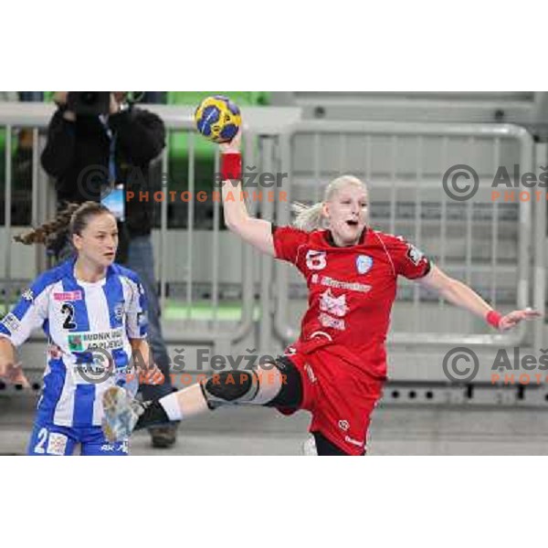 Tamara Mavsar of RK Krim Mercator and Radmila Miljanic in action during handball match RK Krim Mercator -Buducnost Podgorica in EHF Women\'s Champions league, played in Stozice, Ljubljana, Slovenia on February 24,2012 