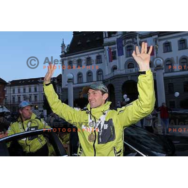 Jakov Fak of Slovenia with medals from World Biathlon Championships in Ruhpolding during reception for the fans at Congress Square in Ljubljana, Slovenia on March 12,2012 