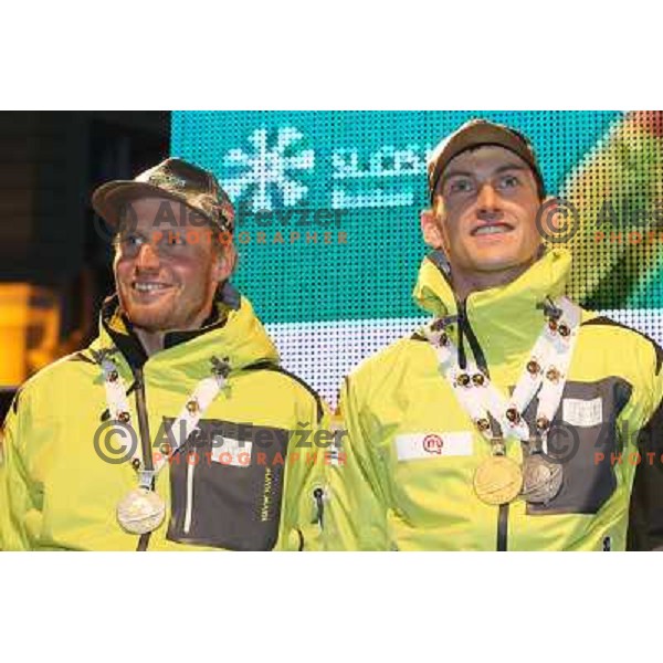 Jakov Fak, Klemen Bauer of Slovenia with medals from World Biathlon Championships in Ruhpolding during reception for the fans at Congress Square in Ljubljana, Slovenia on March 12,2012 