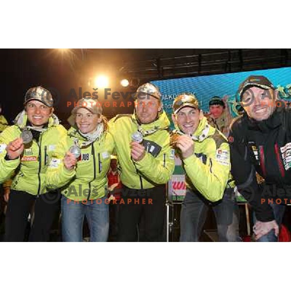 Jakov Fak, Teja Gregorin, Andreja Mali, Klemen Bauer of Slovenia with medals from World Biathlon Championships in Ruhpolding during reception for the fans at Congress Square in Ljubljana, Slovenia on March 12,2012 