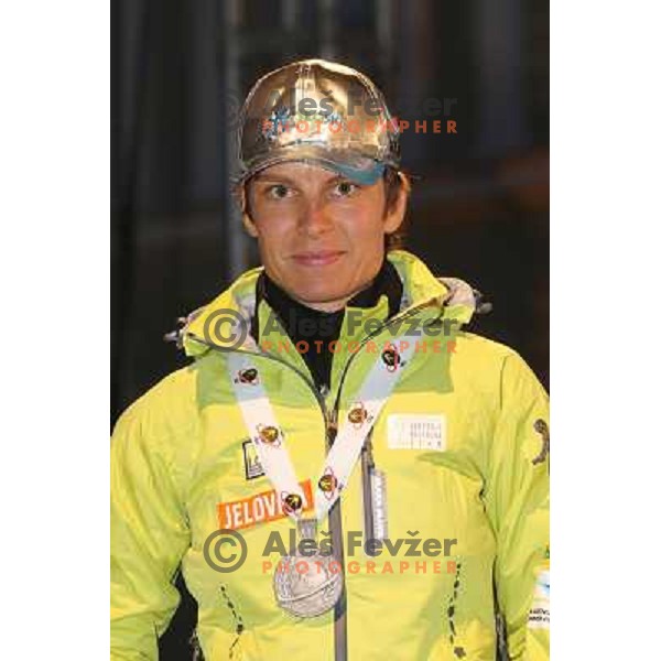  Teja Gregorin of Slovenia with medals from World Biathlon Championships in Ruhpolding during reception for the fans at Congress Square in Ljubljana, Slovenia on March 12,2012 