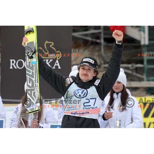 Simon Ammann of Switzerland on second place during final competition of FIS World Cup Ski Jumping Planica in Planica, Slovenia on March 18, 2012 