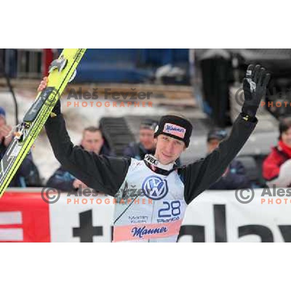 Martin Koch of Austria on first place during final competition of FIS World Cup Ski Jumping Planica in Planica, Slovenia on March 18, 2012 