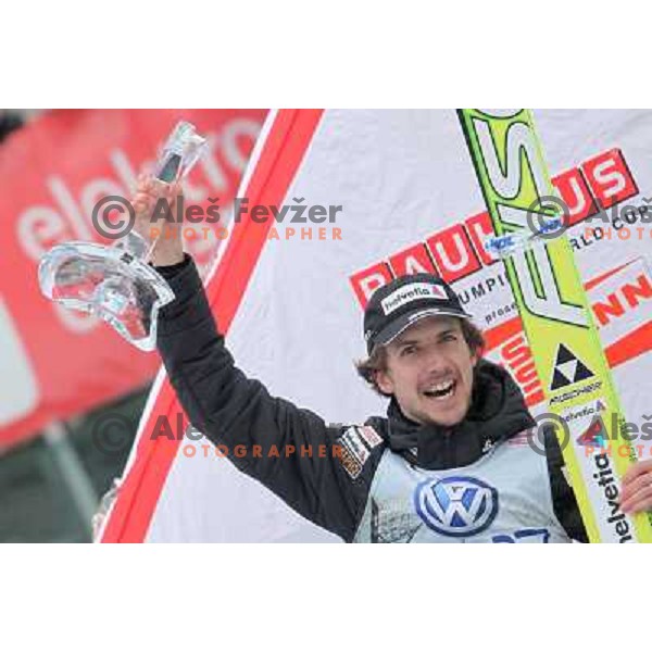 Simon Ammann of Switzerland on second place during final competition of FIS World Cup Ski Jumping Planica in Planica, Slovenia on March 18, 2012 