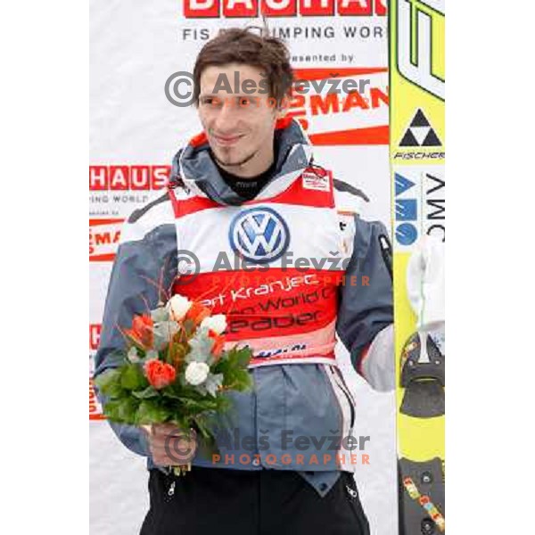 Robert Kranjec of Slovenia on third place during final competition of FIS World Cup Ski Jumping Planica in Planica, Slovenia on March 18, 2012 