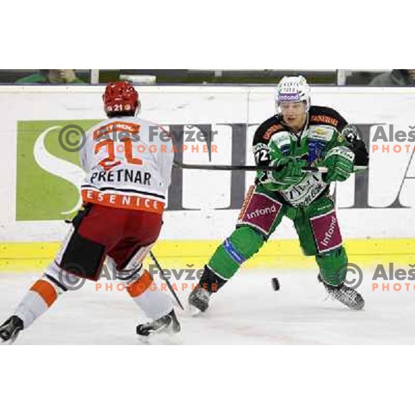 John Hughes of Olimpija in action during first match of the Final of Slovenian ice-hocey Championships, played in Hala Tivoli, Ljubljana, Slovenia on March 26, 2012 