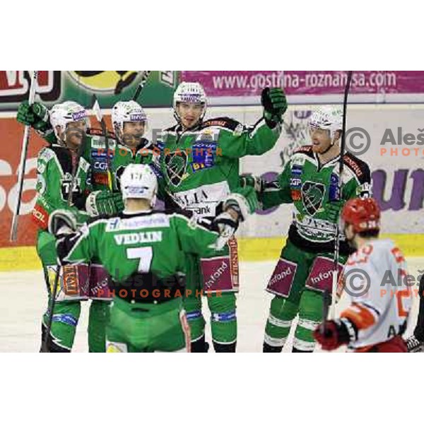 John Hughes, Ales Music, Justin Taylor, Jamie Fraser, Domen Vedlin of Olimpija celebrate goal during first match of the Final of Slovenian ice-hocey Championships, played in Hala Tivoli, Ljubljana, Slovenia on March 26, 2012 