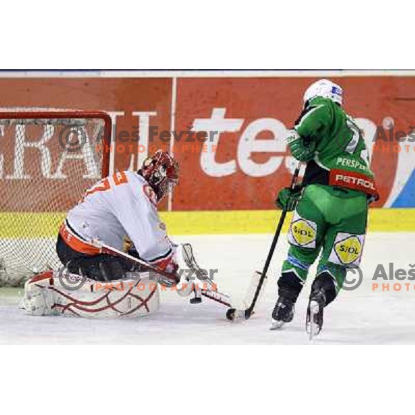 John Hughes of Olimpija and Mihal Fikrt of Acroni Jesenice in action during first match of the Final of Slovenian ice-hocey Championships, played in Hala Tivoli, Ljubljana, Slovenia on March 26, 2012 