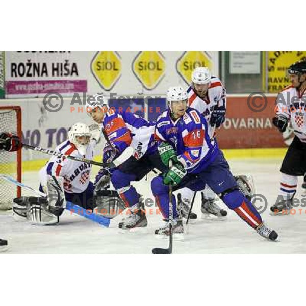 Ales Music, Marcel Rodman of Slovenia in action during friendly ice-hockey match Slovenia-Croatia in Hala Tivoli, Ljubljana, Slovenia on April 7, 2012 