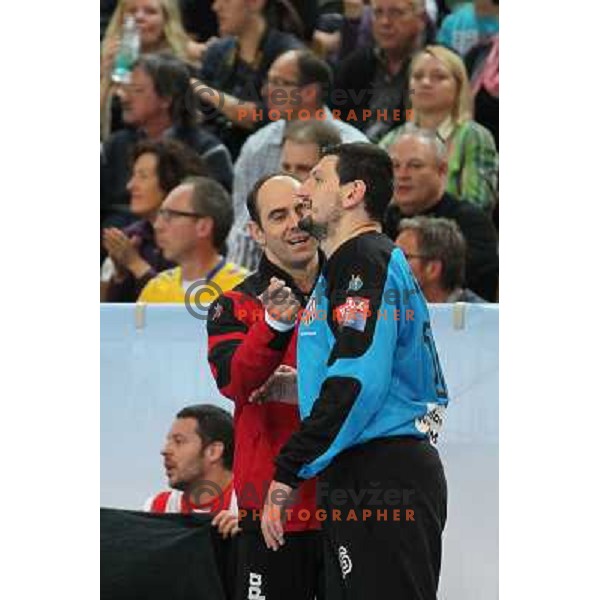 Jose Hombrados and Arpad Sterbik of Atletico Madrid during handball match RK Cimos Koper (Slovenia) and BM Atletico Madrid (Spain) in VELUX EHF Champions league 2011-2012, played in Bonifika Hall, Koper, Slovenia on April 22, 2012 
