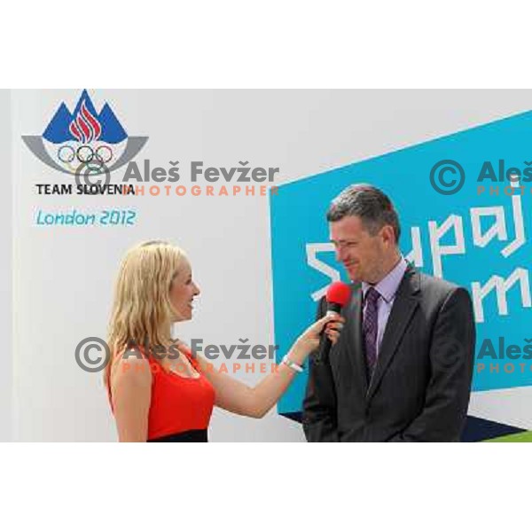 Sanja Modric and Berlocnik at Presentation of Slovenia Olympic team clothing collection for London 2012 Summer Olympic Games at Petrol station in Ljubljana, Slovenia on June 22, 2012 