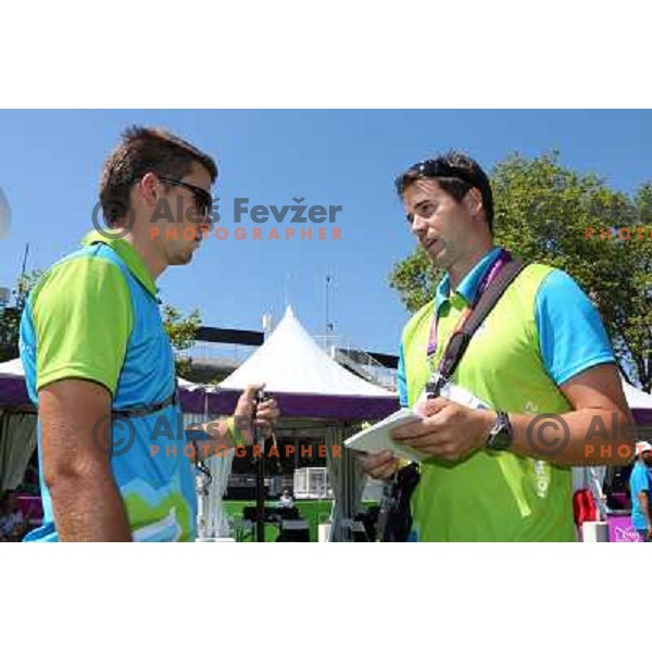 Klemen Strajhar and coach Matej Zupanc of Slovenia in action during practice session in archery at Lord\'s Cricket ground during London 2012 Summer Olympic games, Great Britain on July 25, 2012 