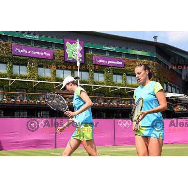 Katarina Srebotnik and Andreja Klepac of Slovenia in action during practice session at All England Lawn Tennis and Croquet Club in Wimbledon, London 2012 Summer Olympic games, Great Britain on July 25, 2012 
