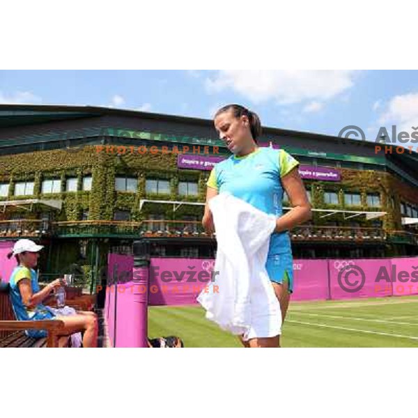 Katarina Srebotnik and Andreja Klepac of Slovenia in action during practice session at All England Lawn Tennis and Croquet Club in Wimbledon, London 2012 Summer Olympic games, Great Britain on July 25, 2012 