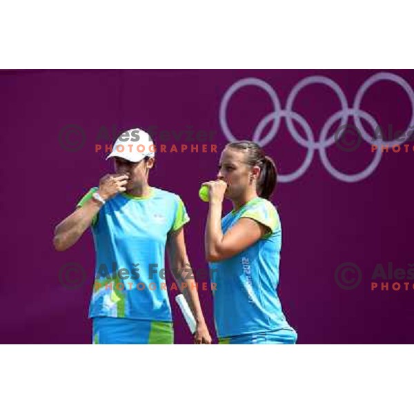 Katarina Srebotnik and Andreja Klepac of Slovenia in action during practice session at All England Lawn Tennis and Croquet Club in Wimbledon, London 2012 Summer Olympic games, Great Britain on July 25, 2012 