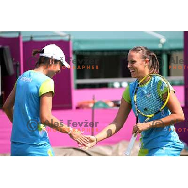 Katarina Srebotnik and Andreja Klepac of Slovenia in action during practice session at All England Lawn Tennis and Croquet Club in Wimbledon, London 2012 Summer Olympic games, Great Britain on July 25, 2012 