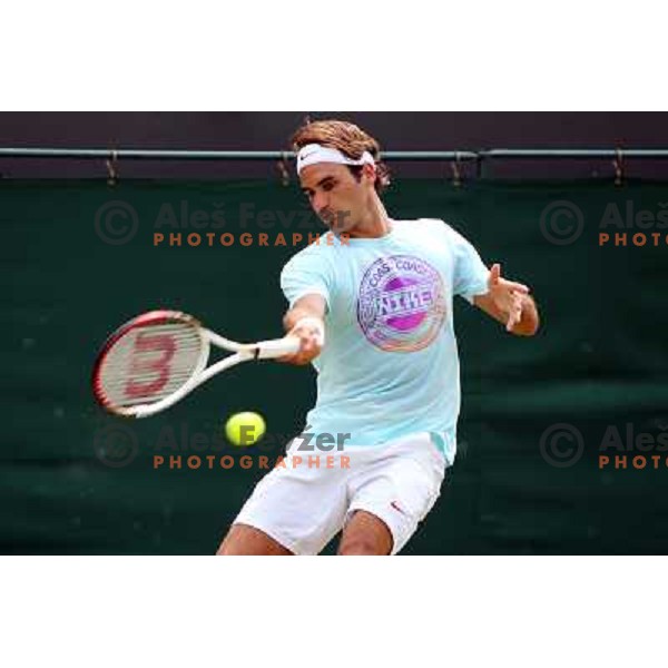 Roger Federer of Switzerland in action during practice session at All England Lawn Tennis and Croquet Club in Wimbledon, London 2012 Summer Olympic games, Great Britain on July 25, 2012 