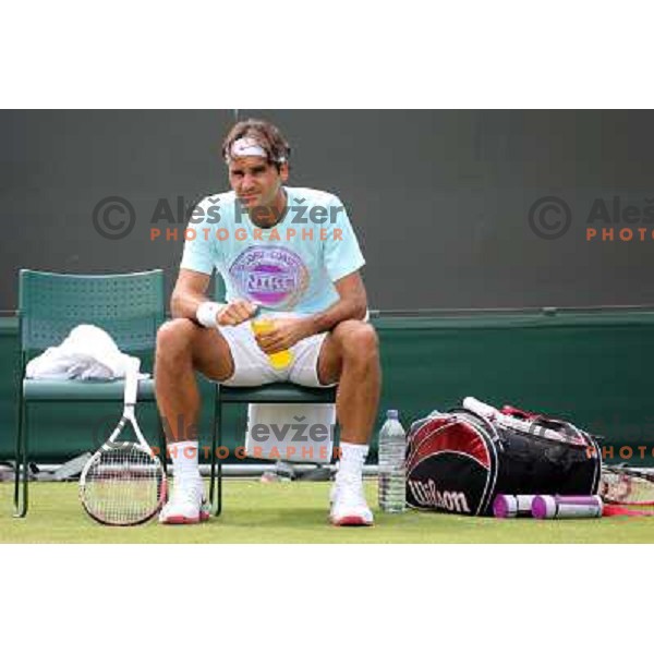 Roger Federer of Switzerland in action during practice session at All England Lawn Tennis and Croquet Club in Wimbledon, London 2012 Summer Olympic games, Great Britain on July 25, 2012 