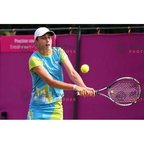 Katarina Srebotnik of Slovenia in action during practice session at All England Lawn Tennis and Croquet Club in Wimbledon, London 2012 Summer Olympic games, Great Britain on July 25, 2012 