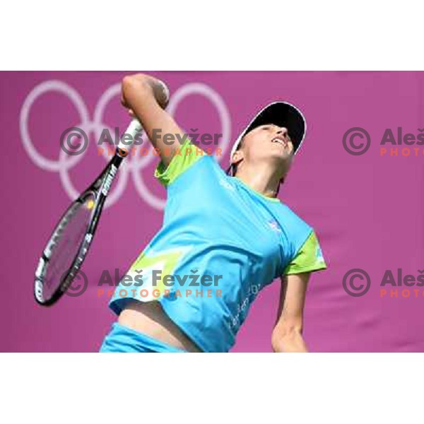 Katarina Srebotnik of Slovenia in action during practice session at All England Lawn Tennis and Croquet Club in Wimbledon, London 2012 Summer Olympic games, Great Britain on July 25, 2012 