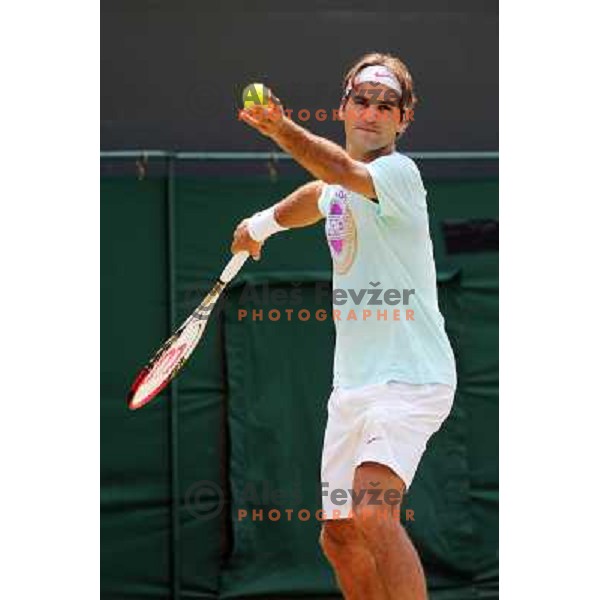 Roger Federer of Switzerland in action during practice session at All England Lawn Tennis and Croquet Club in Wimbledon, London 2012 Summer Olympic games, Great Britain on July 25, 2012 