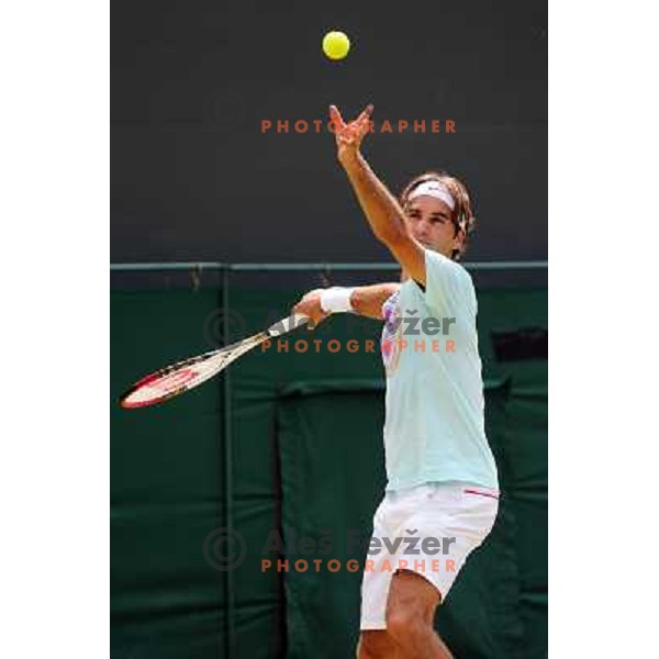Roger Federer of Switzerland in action during practice session at All England Lawn Tennis and Croquet Club in Wimbledon, London 2012 Summer Olympic games, Great Britain on July 25, 2012 