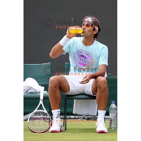 Roger Federer of Switzerland in action during practice session at All England Lawn Tennis and Croquet Club in Wimbledon, London 2012 Summer Olympic games, Great Britain on July 25, 2012 