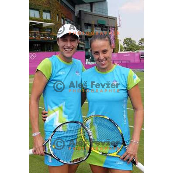 Katarina Srebotnik and Andreja Klepac of Slovenia in action during practice session at All England Lawn Tennis and Croquet Club in Wimbledon, London 2012 Summer Olympic games, Great Britain on July 25, 2012 